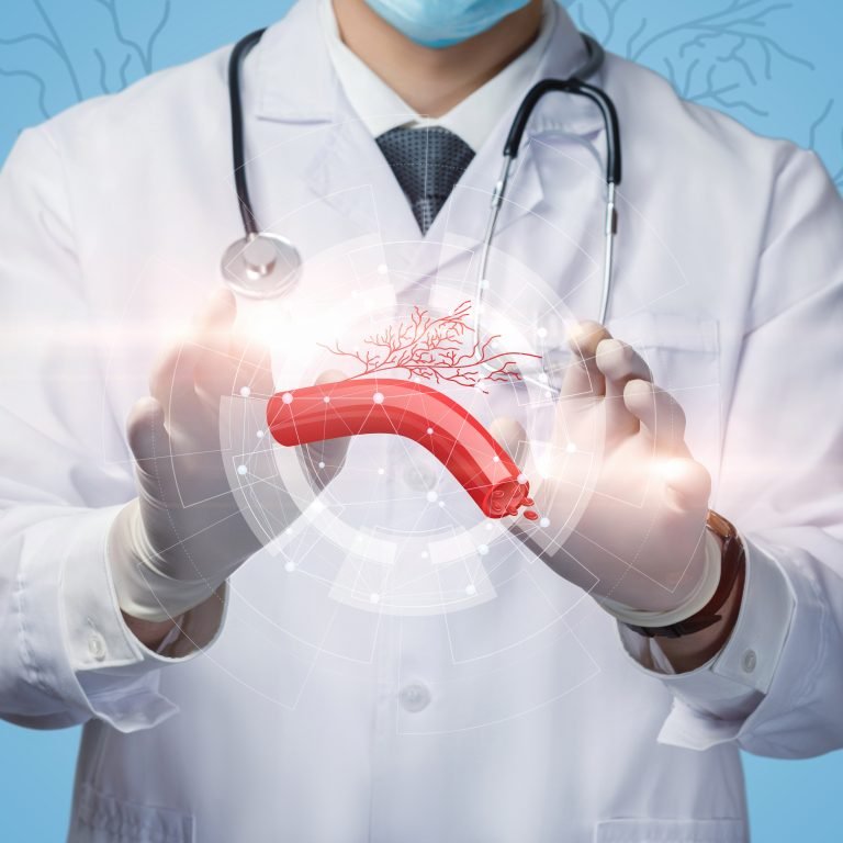 Concept of treatment of vascular disease. The doctor shows a blood vein on a blue background.